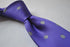 purple tie with grey polka dots