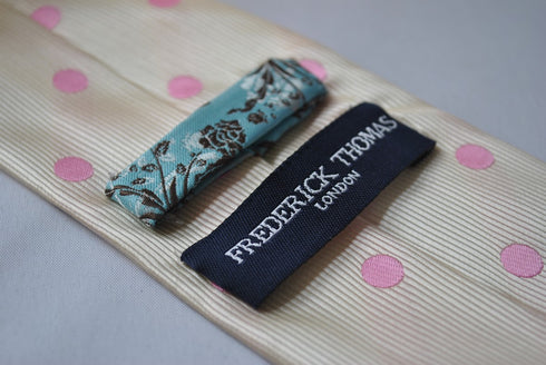 ivory tie with pink polka dots