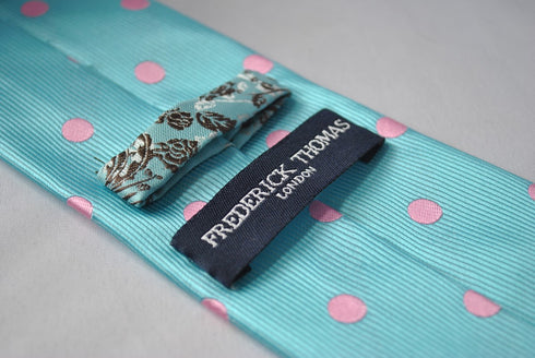 turquoise tie with pink polka dots