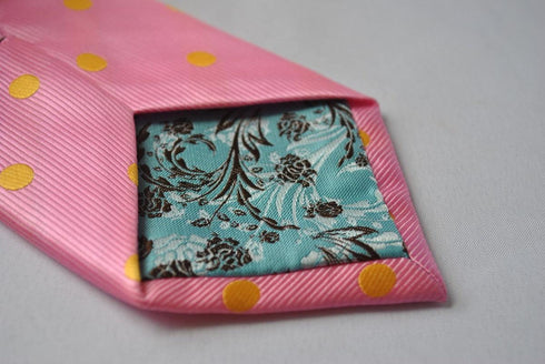 pink tie with yellow polka dots