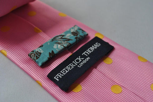 pink tie with yellow polka dots