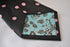 black tie with pink polka dots