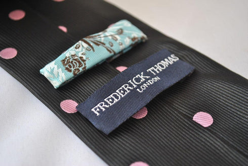 black tie with pink polka dots