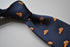 navy tie with clown fish pattern