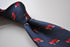 navy blue tie with red fox print design