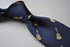 navy tie with acoustic guitar print