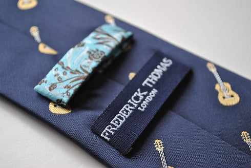 navy tie with acoustic guitar print