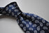 navy tie with paisley design