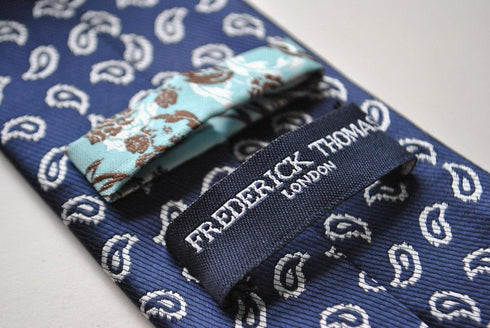 navy tie with paisley design