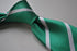 green tie with white club stripes