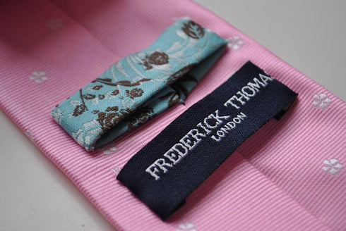 pink tie with delicate floral pattern