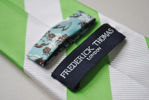 green and white barber striped tie