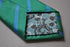 green tie with blue club stripes