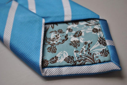 medium blue tie with white club stripes