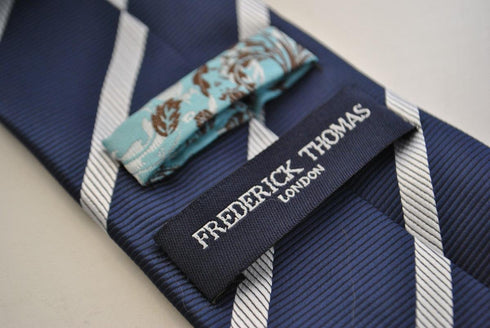 navy tie with white club stripes