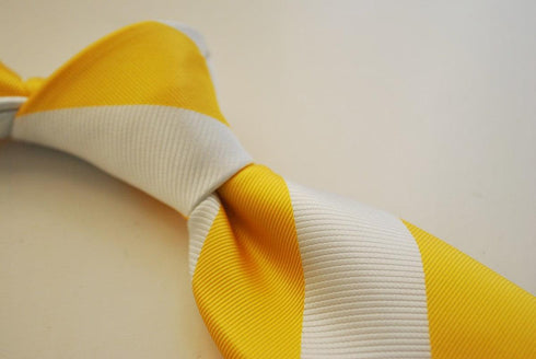 yellow and white barber striped tie