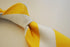 yellow and white barber striped tie