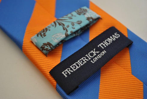 burnt orange and blue barber striped tie