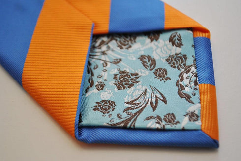 burnt orange and blue barber striped tie