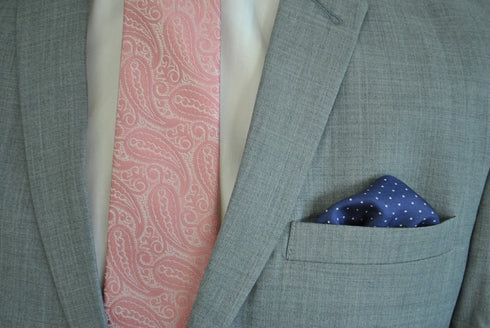navy and white pin spotted silk pocket square with pink edging