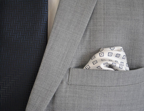 navy patterned four corner silk pocket square with navy edging