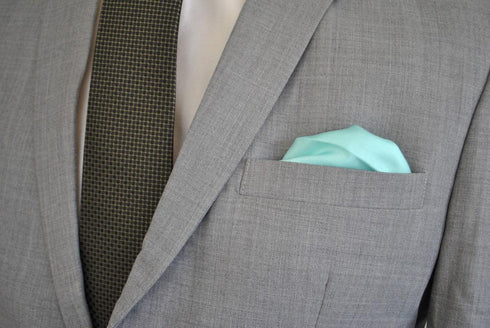 turquoise silk pocket square with white edging