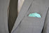 turquoise silk pocket square with white edging