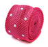 bright pink skinny knitted tie with white polka dots