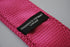 bright pink skinny knitted tie with white polka dots