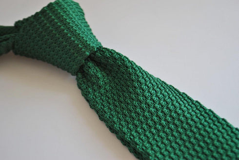 green skinny knitted tie with white tip