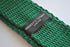 green skinny knitted tie with white tip