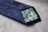 navy tie with blue polka dots