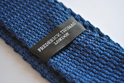navy blue skinny knitted tie with cream tip