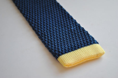 navy blue skinny knitted tie with yellow tip