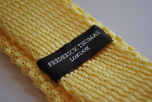lemon yellow skinny knitted tie with navy blue tip