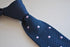 navy blue skinny knitted tie with lilac purple polka dots