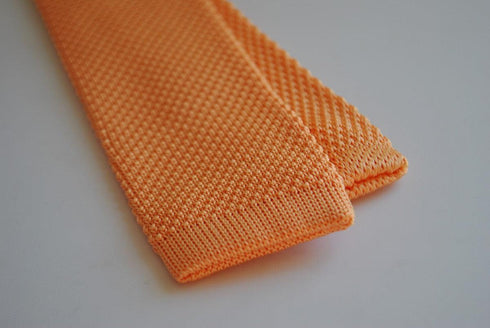 plain peach orange skinny knitted tie with pointed end