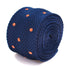 navy blue skinny knitted tie with orange polka dots