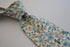 skinny cotton ivory cream tie with blue floral design