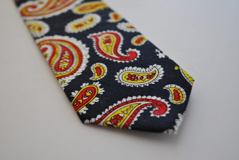 skinny cotton black tie with red and yellow paisley design