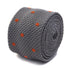 grey skinny knitted tie with orange polka dots