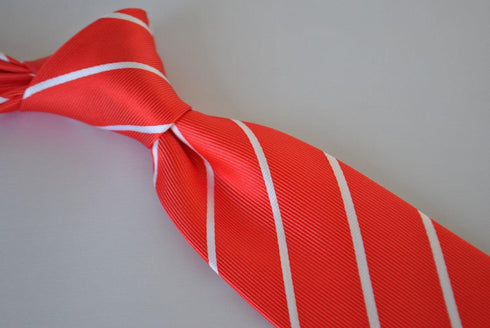 red tie with thin white stripes