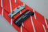red tie with thin white stripes