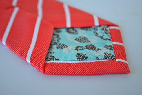 red tie with thin white stripes