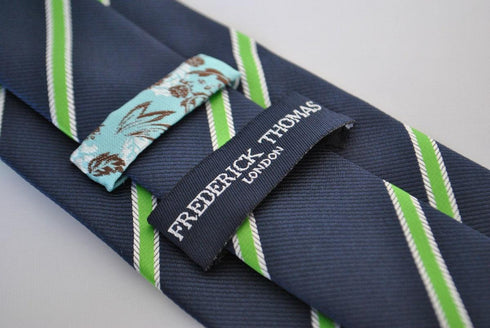 navy tie with green and white club stripes