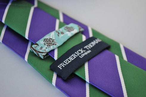 green, purple and white striped tie