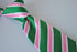 green, pink and white striped tie