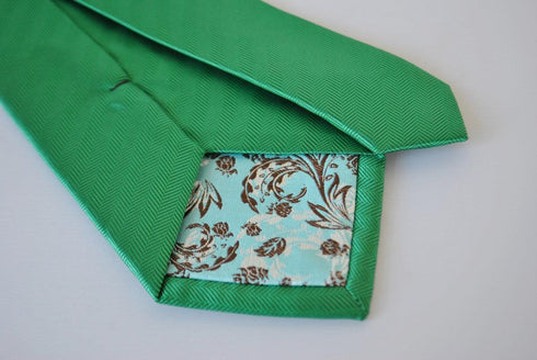 plain green tie with herringbone pattern