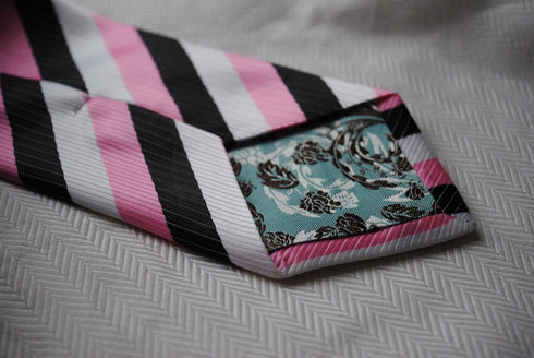 pink, black and white striped tie