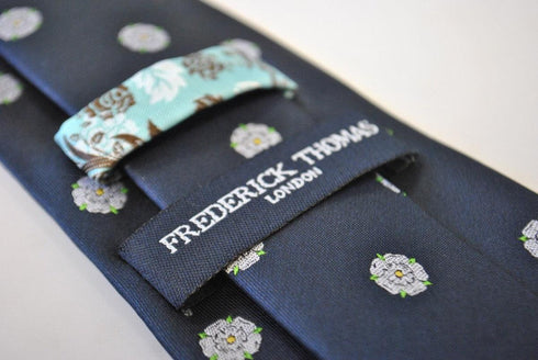 navy tie with white rose flower of yorkshire design